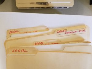 Original folders labeled "LEGAL" in the Dr. and Mrs. Wyatt Tee Walker Collection.